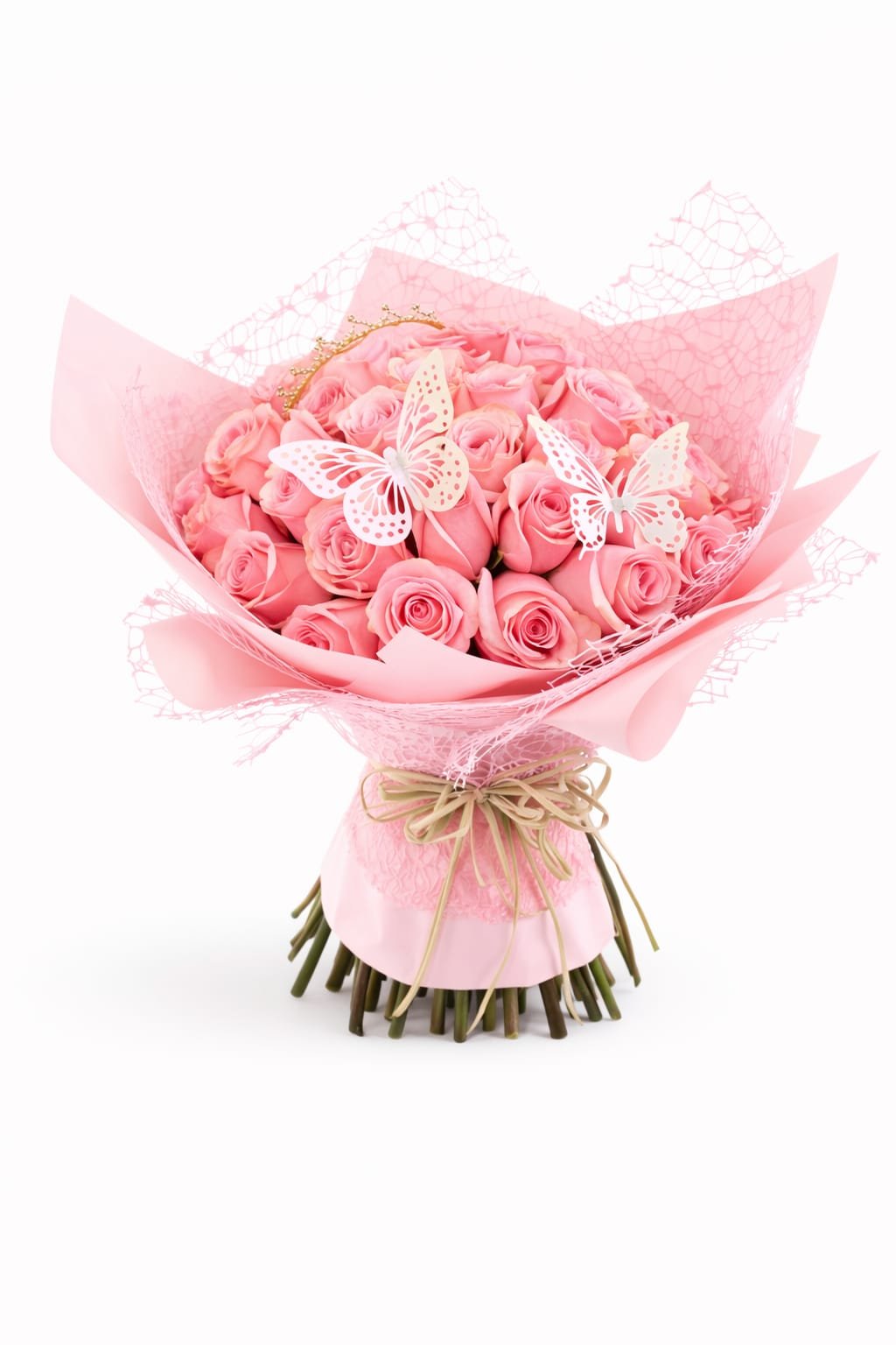 Pink rose bouquet wrapped in textured paper with butterfly accents